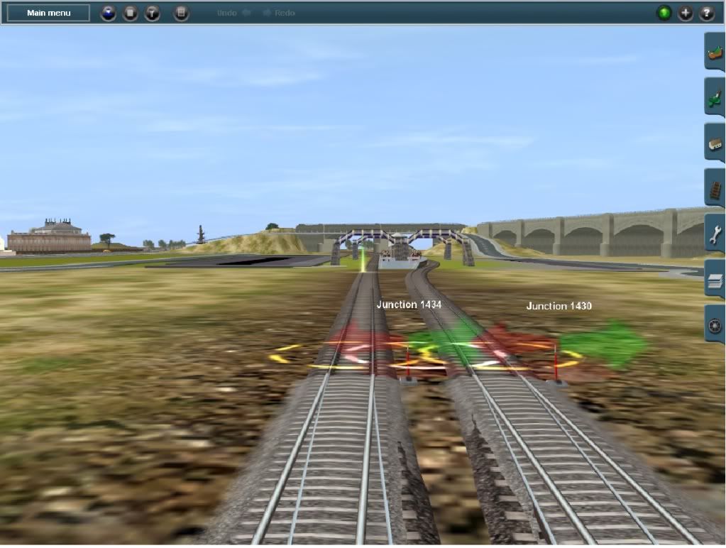 PassangersWaitingonthePlatformfortheAirportTraintocomethrough.jpg
