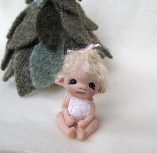 this one I adopted- a jointed baby fairy. 